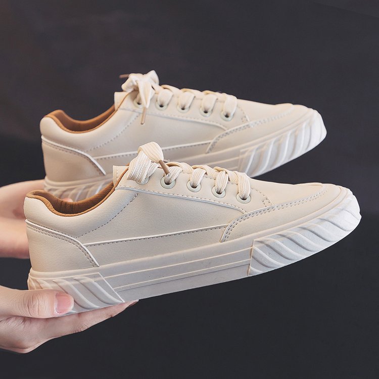 Kleine weiße Lederschuhe für Damen, die schmale Füße betonen, und Schnürschuhe aus Canvas für Damen