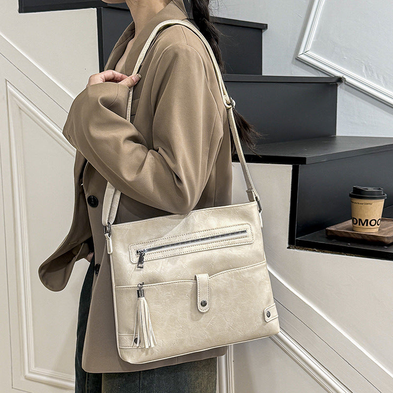 Handtasche mit Quasten-Accessoires für Damen